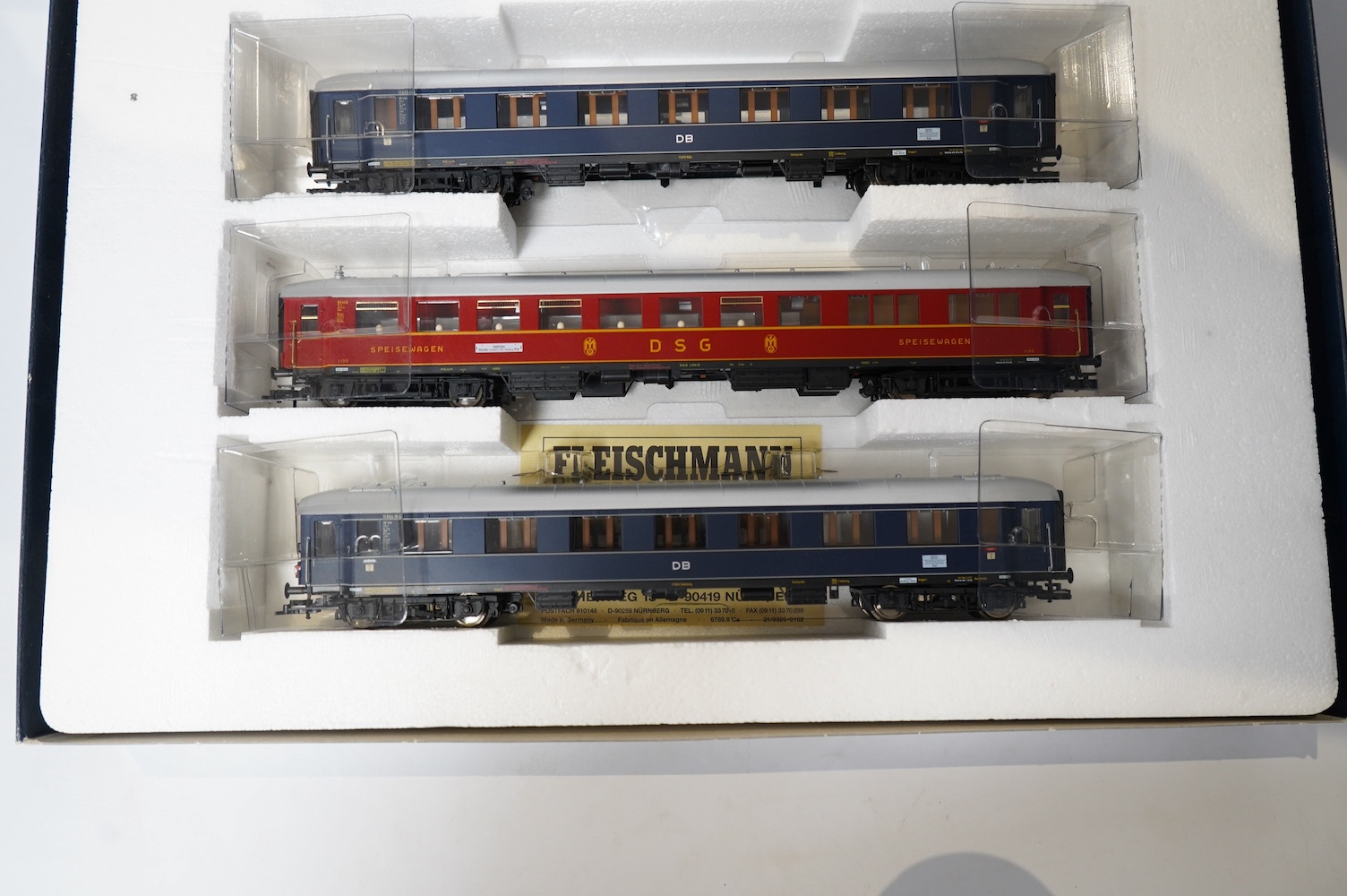 Two boxed Fleischmann HO gauge German passenger train sets, both comprising of a tender locomotive and bogie coaches (4885 and 4894), together with a Liliput 4-6-2 locomotive (4001) and a DR Rhinegold coach set (820), (4